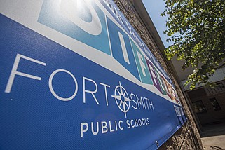 A Fort Smith Public Schools logo displays on a banner on Friday, July 8, 2022, at Sunnymede Elementary School in Fort Smith. Visit nwaonline.com/220710Daily/ for today's photo gallery.
(NWA Democrat-Gazette/Hank Layton)